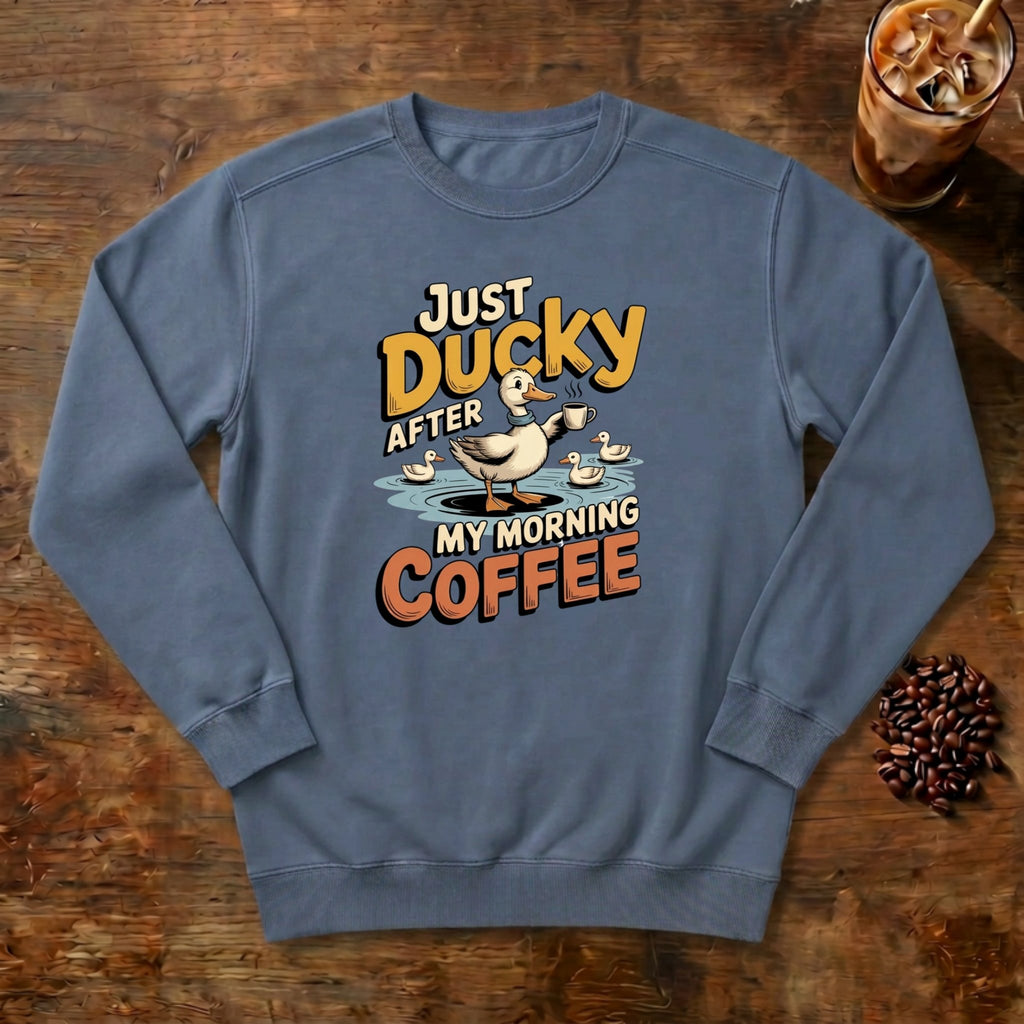Just Ducky After My Morning Coffee Sweatshirt in Blue Jean, a sleepy duck holding its coffee