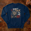 Don't Talk To Me Yet Cat Sweatshirt in True Navy, a grumpy cat clutching a coffee mug
