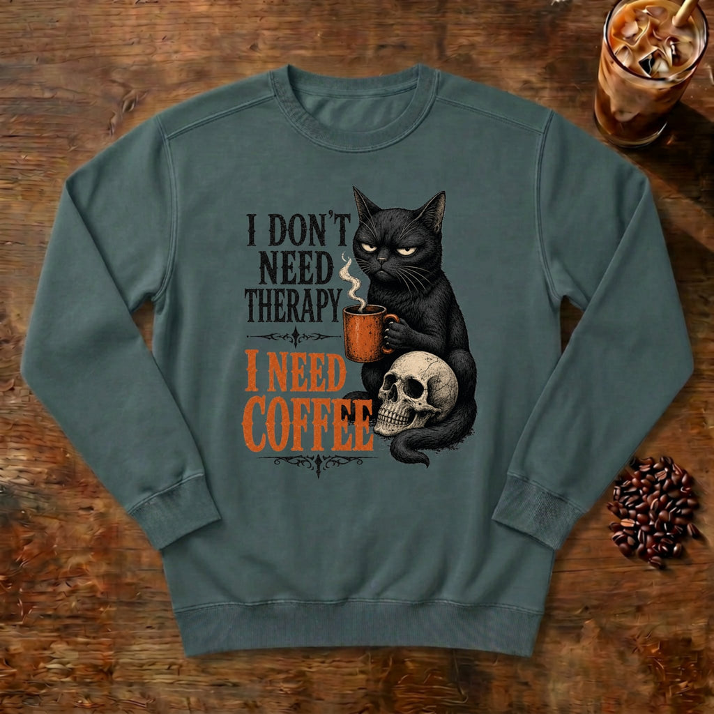 I Don't Need Therapy Cat Sweatshirt in Blue Spruce, a black cat holding a coffee mug and sitting on a skull