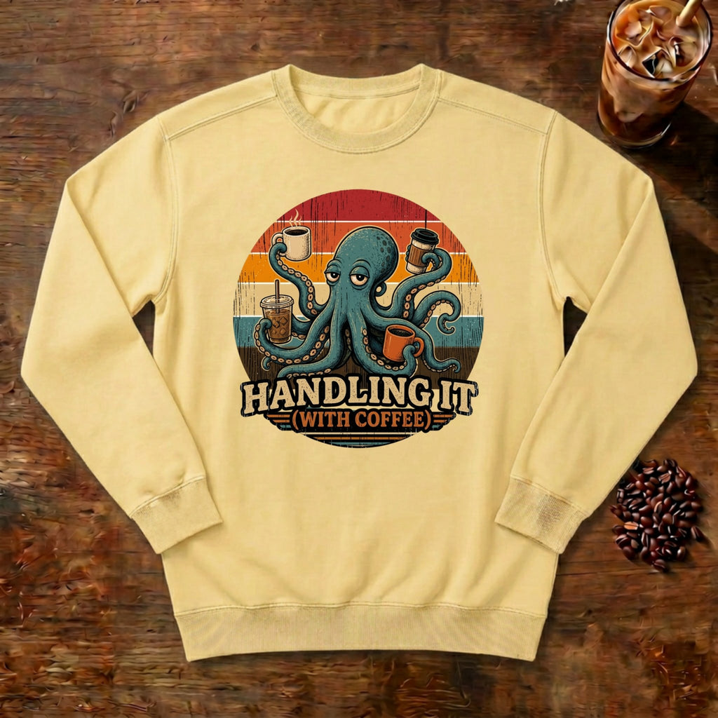 Handling It With Coffee Octopus Sweatshirt in Butter, an octopus juggling coffee mugs