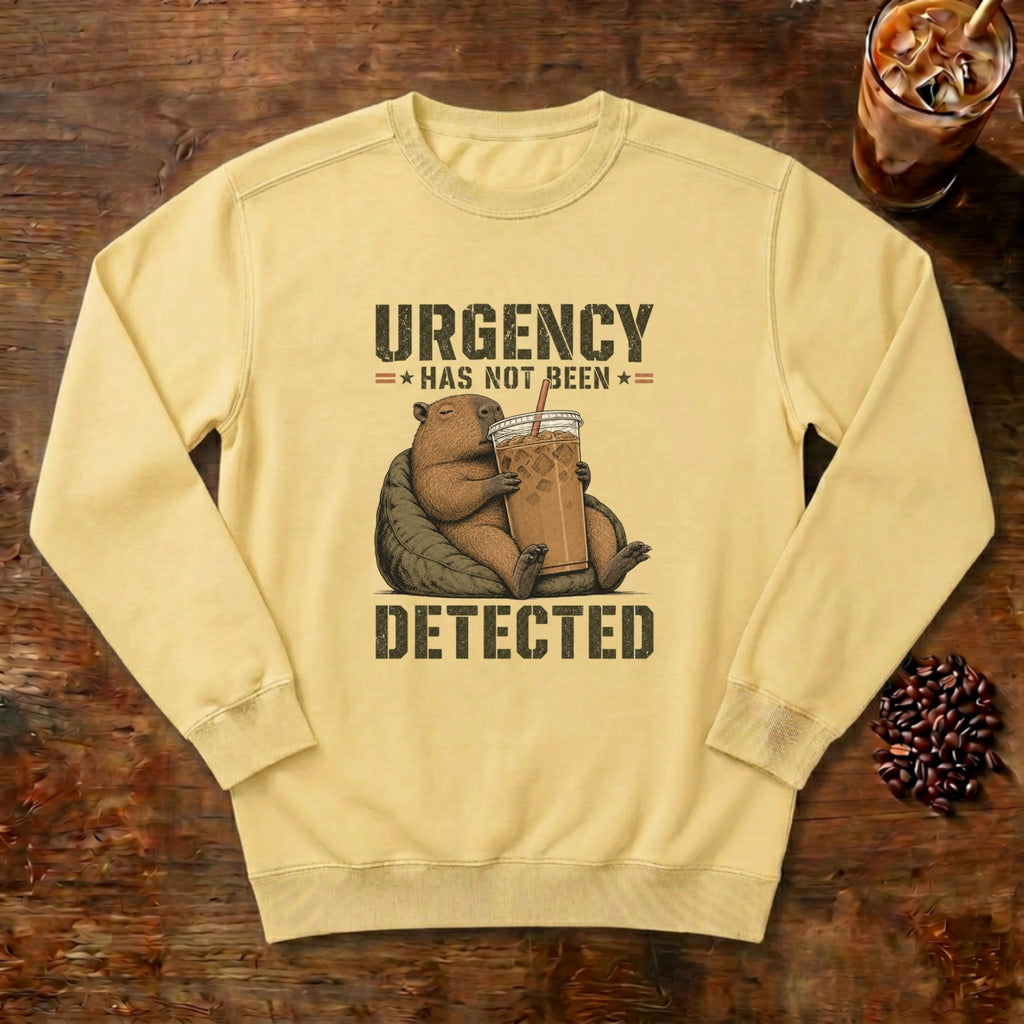 Urgency Not Detected Capybara Sweatshirt in Butter, a relaxed capybara with its coffee