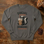 Social Distance Remains Skunk Sweatshirt in Pepper, a retro skunk sipping iced coffee