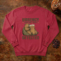 Urgency Not Detected Capybara Sweatshirt in Crimson, a relaxed capybara with its coffee