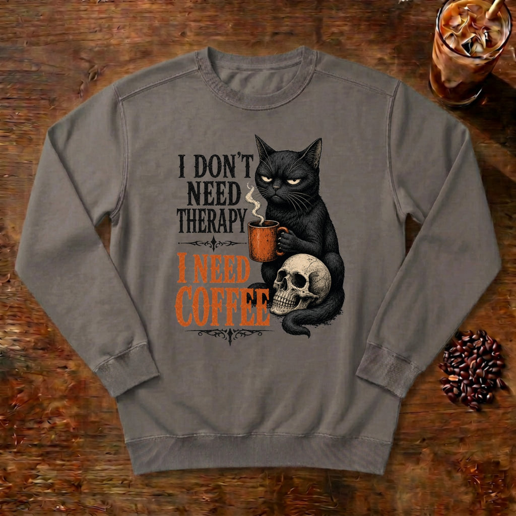 I Don't Need Therapy Cat Sweatshirt in Grey, a black cat holding a coffee mug and sitting on a skull