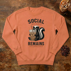 Social Distance Remains Skunk Sweatshirt in Terracotta, a retro skunk sipping iced coffee