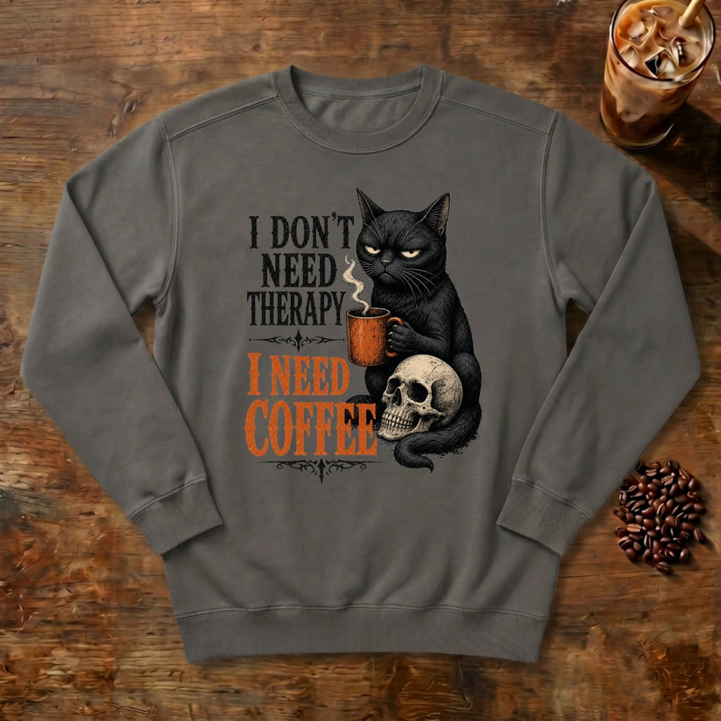 I Don't Need Therapy Cat Sweatshirt in Pepper, a black cat holding a coffee mug and sitting on a skull