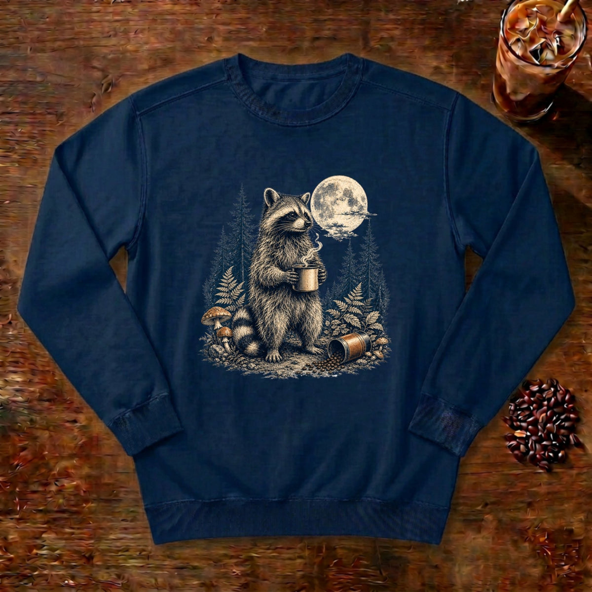 Moonlit Raccoon Coffee Sweatshirt in True Navy, a raccoon with coffee in a moonlit forest