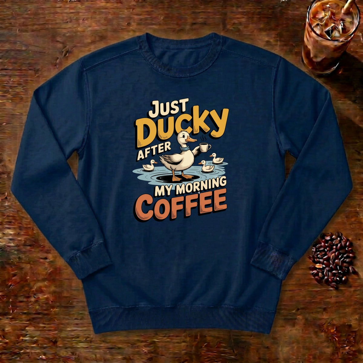 Just Ducky After My Morning Coffee Sweatshirt in True Navy, a sleepy duck holding its coffee