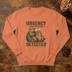 Urgency Not Detected Capybara Sweatshirt in Terracotta, a relaxed capybara with its coffee