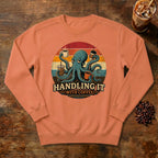 Handling It With Coffee Octopus Sweatshirt in Terracotta, an octopus juggling coffee mugs