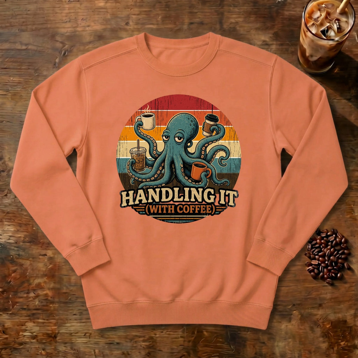 Handling It With Coffee Octopus Sweatshirt in Terracotta, an octopus juggling coffee mugs