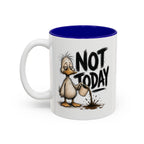 Not Today Duck Coffee Mug, 11 oz, white with blue interior. Wild-haired duck watching his coffee spill from a tipped mug