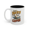 Just Ducky After My Morning Coffee Mug, 11 oz, white with black interior. Cheerful duck raising a coffee cup in a pond with ducklings and “Just Ducky After My Morning Coffee” text