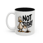 Not Today Duck Coffee Mug, 11 oz, white with black interior. Wild-haired duck watching his coffee spill from a tipped mug
