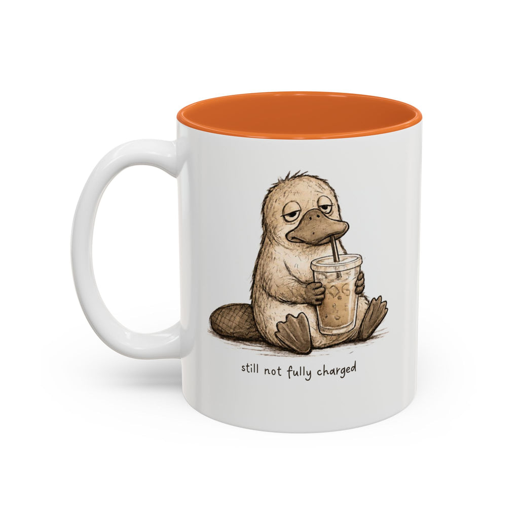 Still Not Fully Charged Platypus Coffee Mug, another view. Sleepy platypus sipping iced coffee with “still not fully charged” text