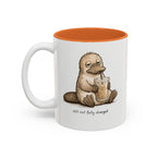 Still Not Fully Charged Platypus Coffee Mug, another view. Sleepy platypus sipping iced coffee with “still not fully charged” text