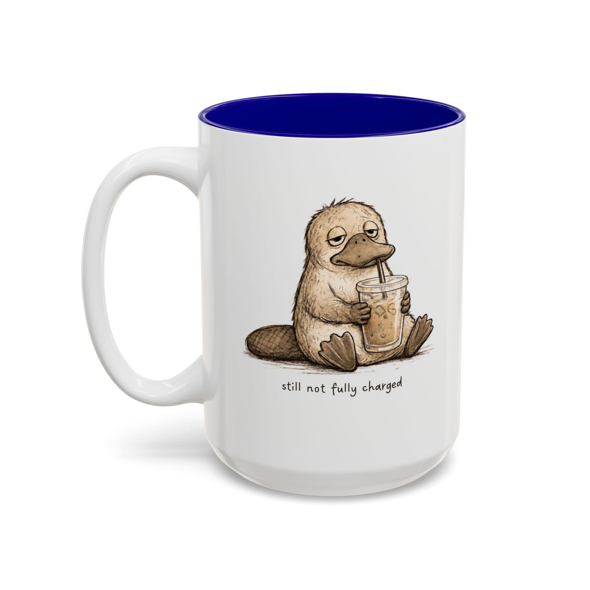 Still Not Fully Charged Platypus Coffee Mug, another view. Sleepy platypus sipping iced coffee with “still not fully charged” text