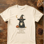 Cat graphic for Spells Sips Repeat Cat on Natural T-shirt