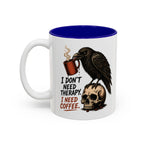 I Don't Need Therapy Raven Coffee Mug, 11 oz, white with blue interior. Raven perched on a skull holding a dripping coffee mug with “I Don't Need Therapy” text