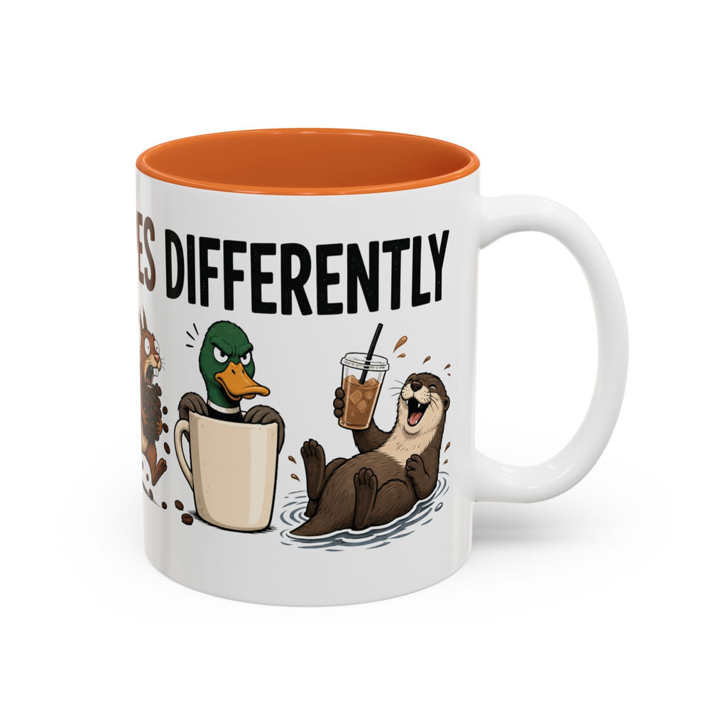 Everyone Copes Differently Animal Coffee Mug, another view. Wraparound mug with a raccoon, sloth, squirrel, duck and otter coping with coffee under “Everyone Copes Differently”