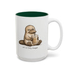 Still Not Fully Charged Platypus Coffee Mug, another view. Sleepy platypus sipping iced coffee with “still not fully charged” text