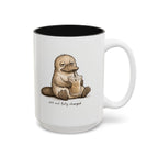Still Not Fully Charged Platypus Coffee Mug, another view. Sleepy platypus sipping iced coffee with “still not fully charged” text