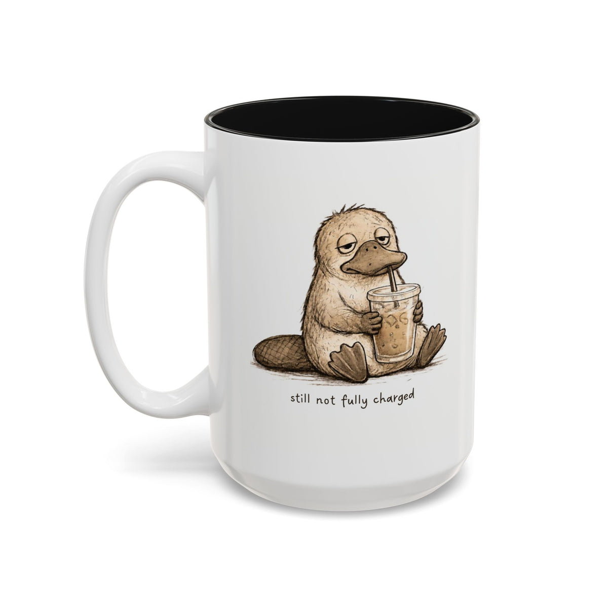 Still Not Fully Charged Platypus Coffee Mug, another view. Sleepy platypus sipping iced coffee with “still not fully charged” text