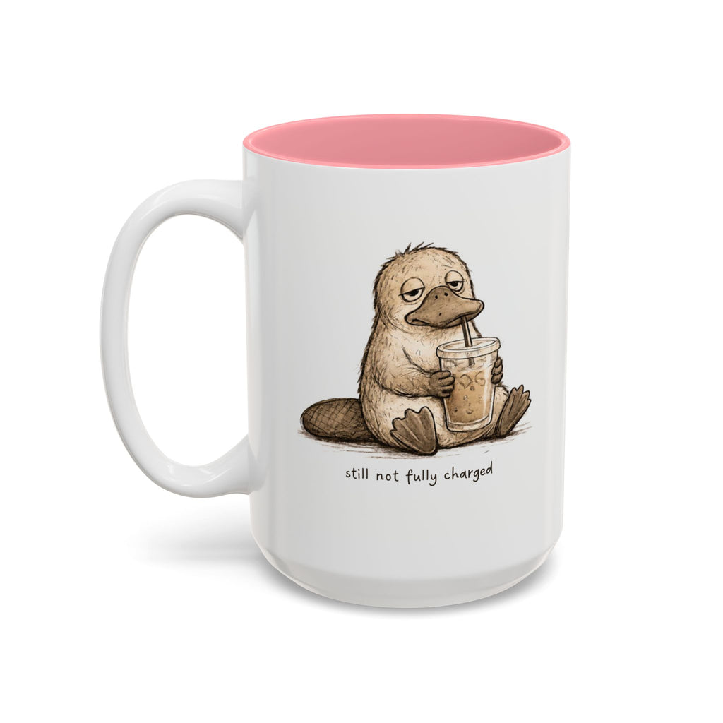 Still Not Fully Charged Platypus Coffee Mug, another view. Sleepy platypus sipping iced coffee with “still not fully charged” text