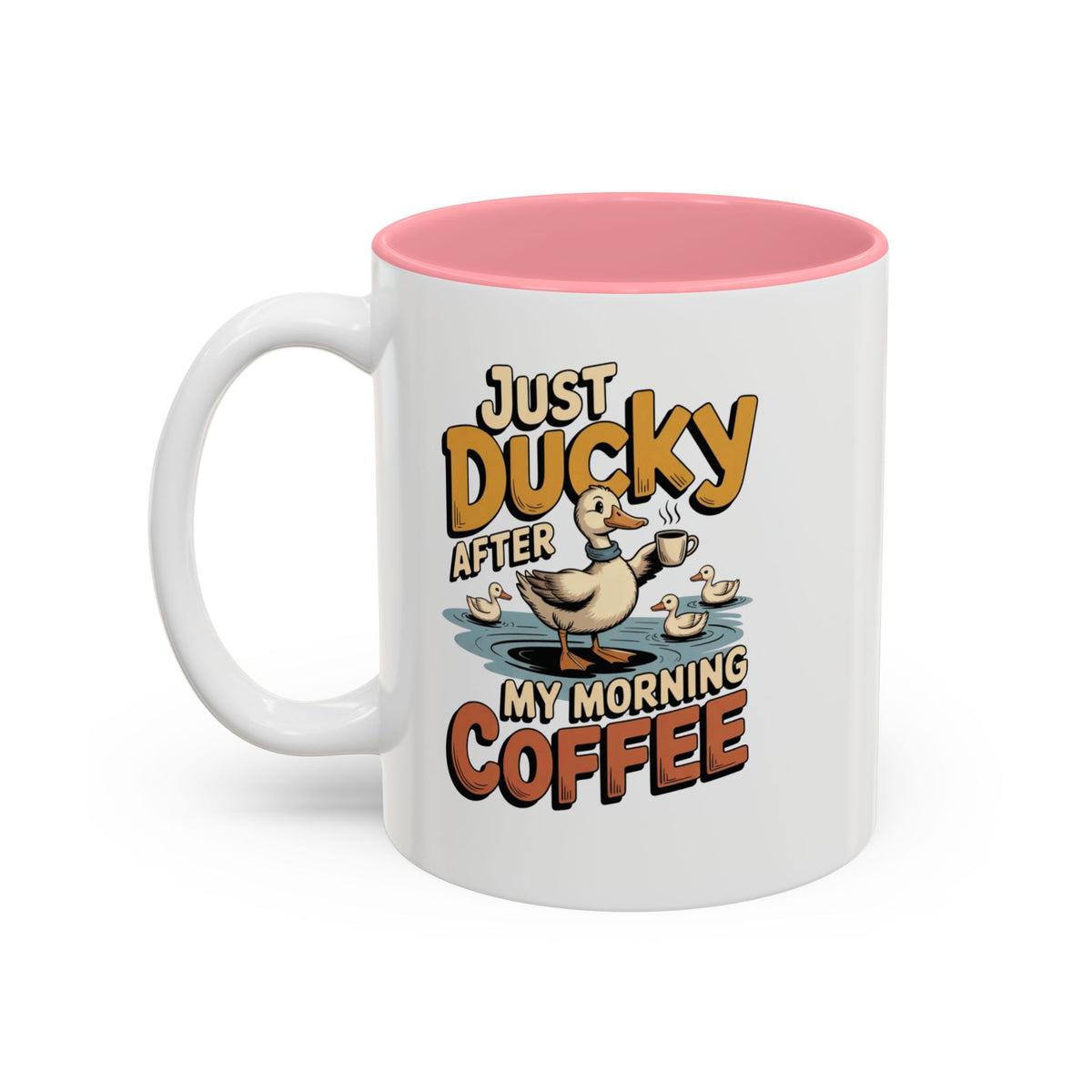 Just Ducky After My Morning Coffee Mug, 11 oz, white with pink interior. Cheerful duck raising a coffee cup in a pond with ducklings and “Just Ducky After My Morning Coffee” text
