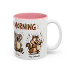 Stages of Morning Animal Coffee Mug, another view. Wraparound mug of cute animals, including a koala and a skunk, going through the “Stages of Morning” with coffee