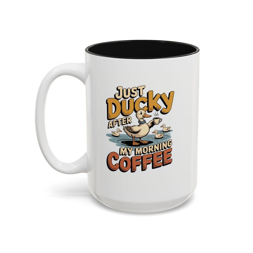 Just Ducky After My Morning Coffee Mug, 15 oz, white with black interior. Cheerful duck raising a coffee cup in a pond with ducklings and “Just Ducky After My Morning Coffee” text