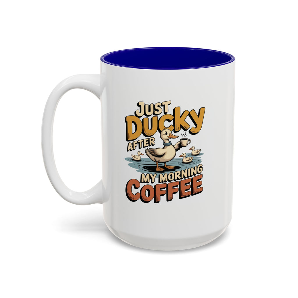Just Ducky After My Morning Coffee Mug, 15 oz, white with blue interior. Cheerful duck raising a coffee cup in a pond with ducklings and “Just Ducky After My Morning Coffee” text