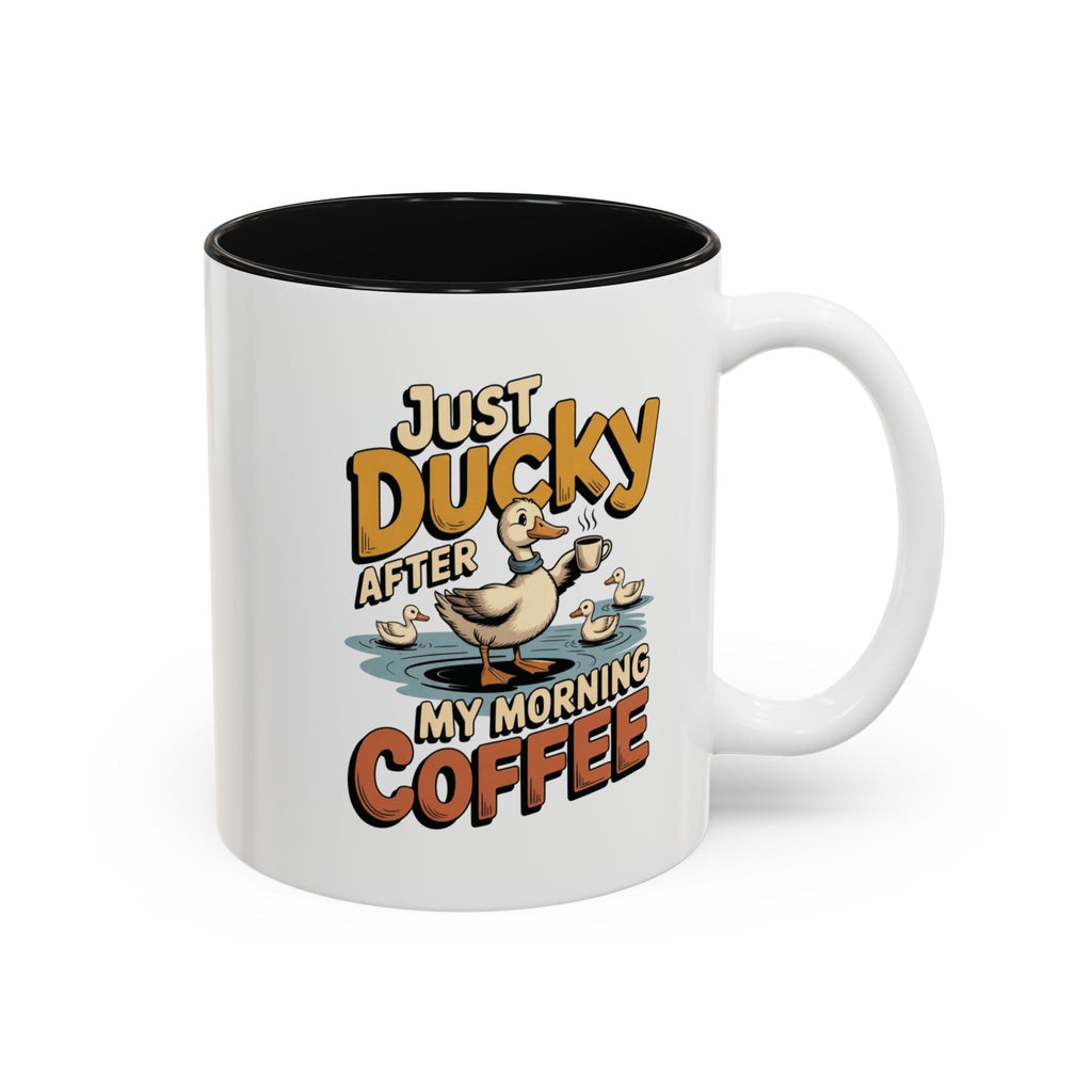 Just Ducky After My Morning Coffee Mug, another view. Cheerful duck raising a coffee cup in a pond with ducklings and “Just Ducky After My Morning Coffee” text