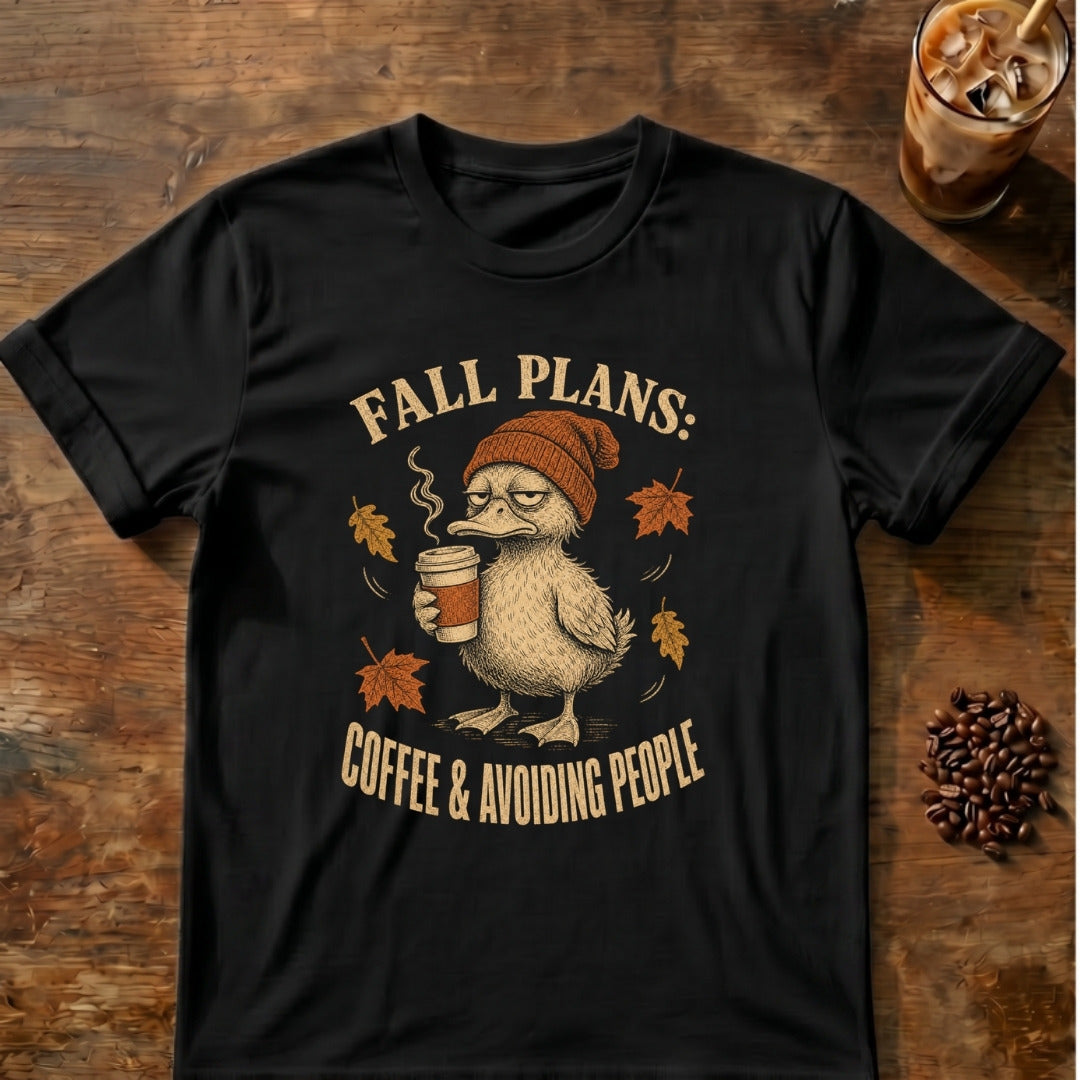 Grumpy duck in a knit beanie holding a steaming coffee among falling leaves with the words Fall Plans: Coffee & Avoiding People on a Black T-shirt.