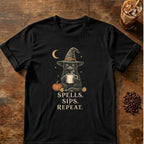 Cat graphic for Spells Sips Repeat Cat on Black T-shirt
