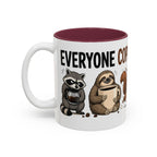 Everyone Copes Differently Animal Coffee Mug, 11 oz, white with maroon interior. Wraparound mug with a raccoon, sloth, squirrel, duck and otter coping with coffee under “Everyone Copes Differently”