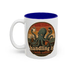 Handling It With Coffee Octopus Mug, 11 oz, white with blue interior. Sleepy octopus juggling four coffees with “Handling It (With Coffee)” text