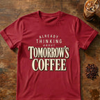 Coffee graphic for Already Thinking About Tomorrow's Coffee on cardinal-red T-shirt