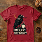 Brooding raven beside a steaming coffee mug and crescent moon with “Dark Roast. Dark Thoughts.” text