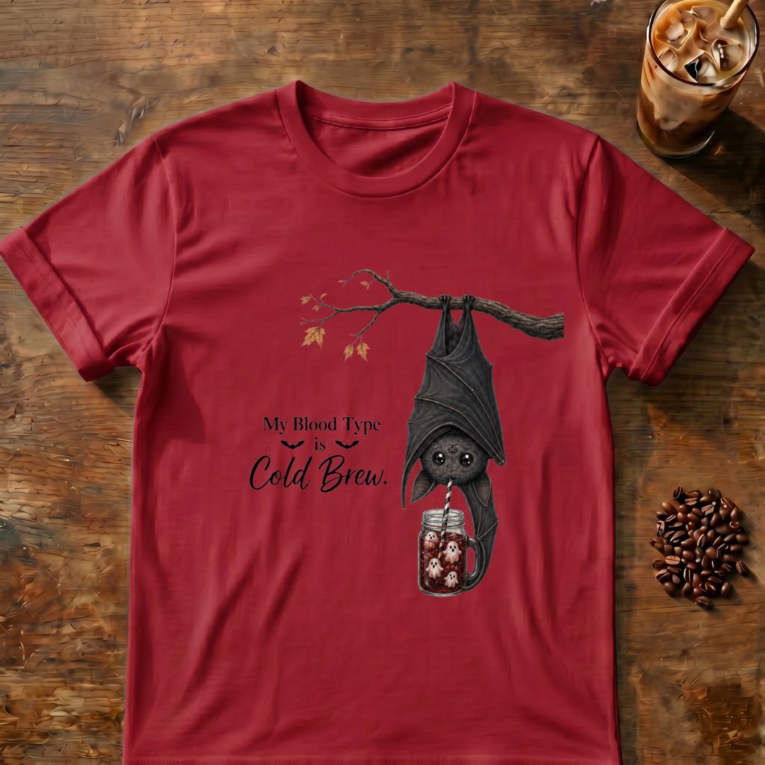 Upside-down bat drinking ghost-filled cold brew with “My Blood Type is Cold Brew” text