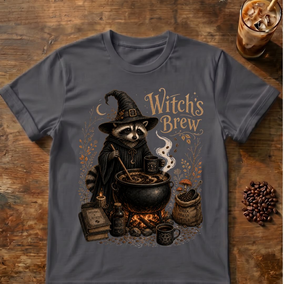 Raccoon dressed as a witch stirring a coffee cauldron with “Witch's Brew” text and coffee-themed spell details