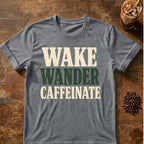 Distressed cream and dark green typography reading “Wake Wander Caffeinate”
