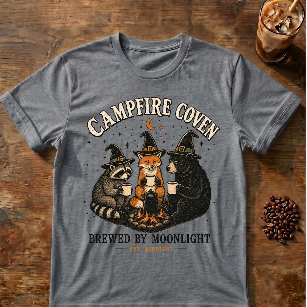 Raccoon coffee graphic for Campfire Coven Coffee on graphite-heather T-shirt