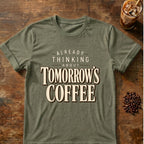 Coffee graphic for Already Thinking About Tomorrow's Coffee on heather-military-green T-shirt