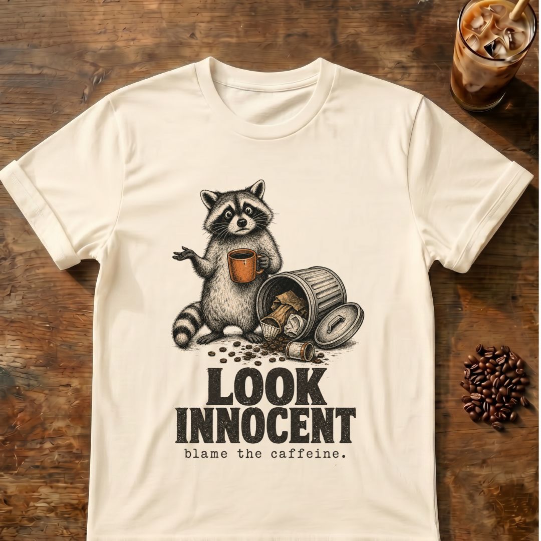 Raccoon coffee graphic for Look Innocent Raccoon on natural T-shirt