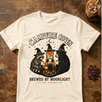 Raccoon coffee graphic for Campfire Coven Coffee on natural T-shirt