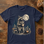 Raccoon coffee graphic for Moonlit Raccoon Coffee on navy T-shirt