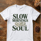 Distressed dark green and cream typography reading “Slow Mornings Wild Soul”