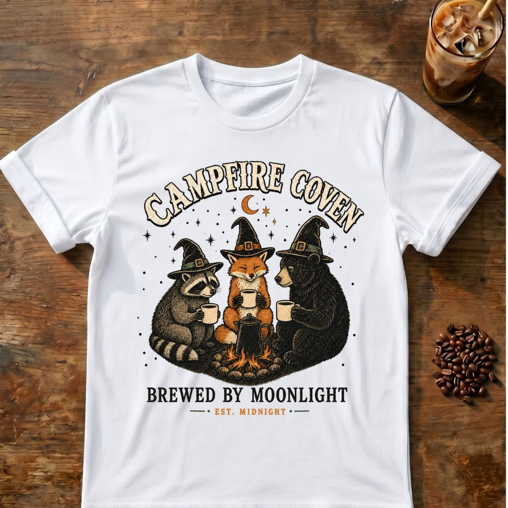 Raccoon coffee graphic for Campfire Coven Coffee on white T-shirt