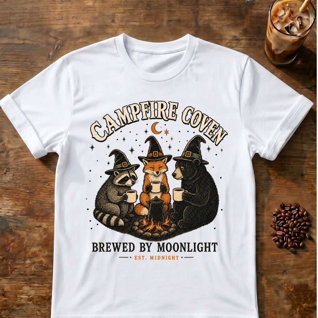 Raccoon coffee graphic for Campfire Coven Coffee on white T-shirt